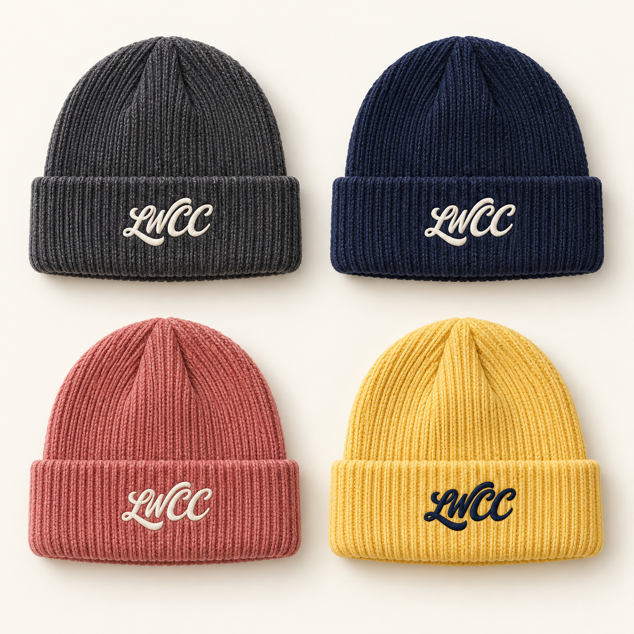 Four ribbed LWCC cuffed beanie hats: washed charcoal, midnight navy, faded rose and sun yellow, with embroidered script logos