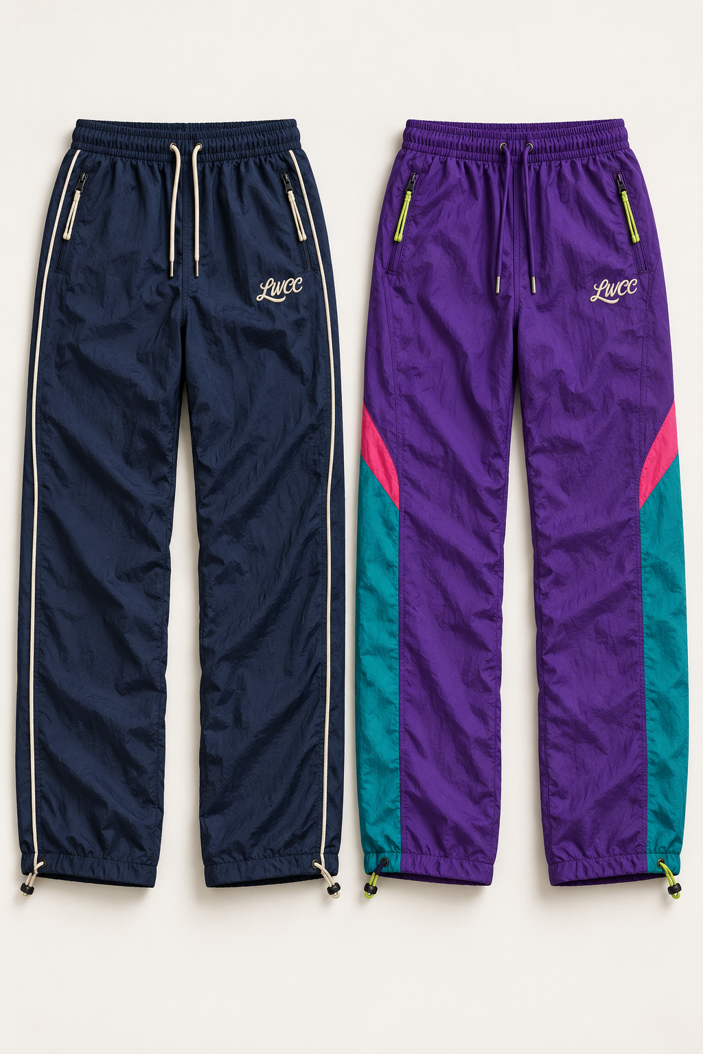 Navy and cream shell trousers alongside a purple and teal version with pink details, both featuring LWCC embroidery