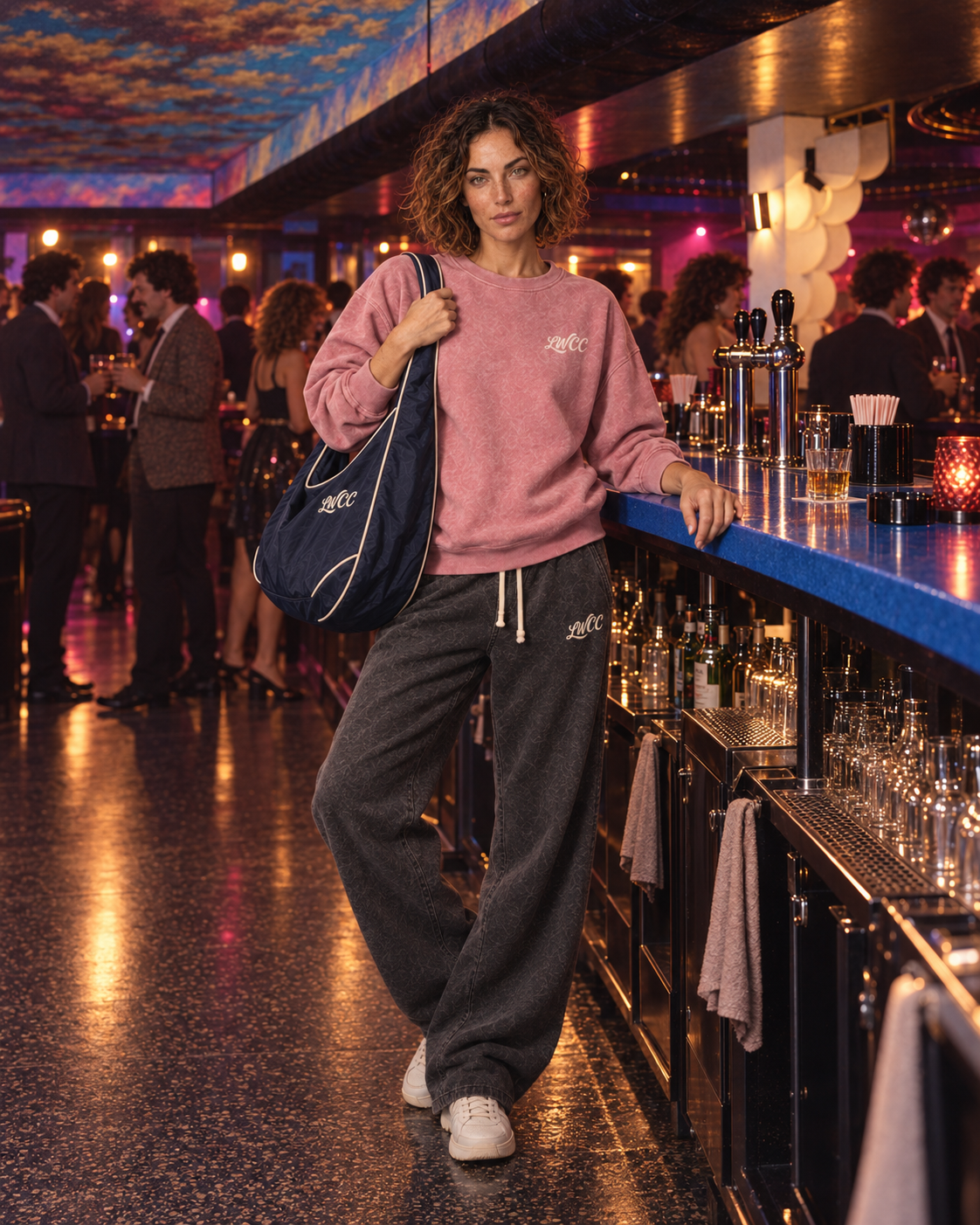 Lost Wight model in faded rose at the blue nightclub bar