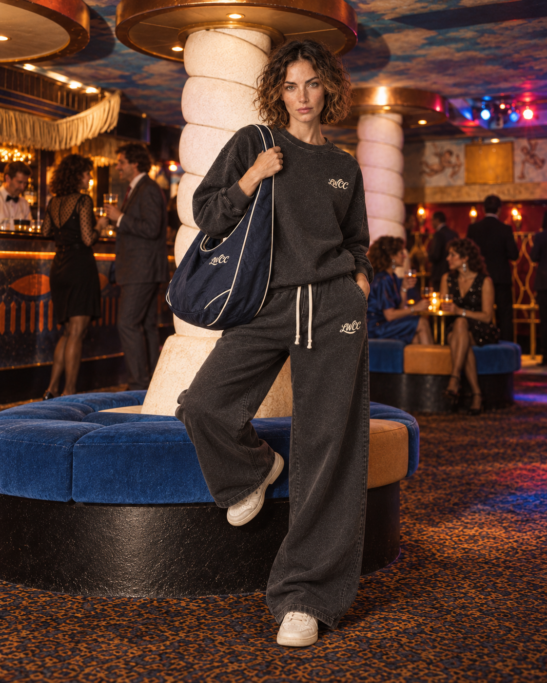 Lost Wight model wearing charcoal sweats in the recreated lounge